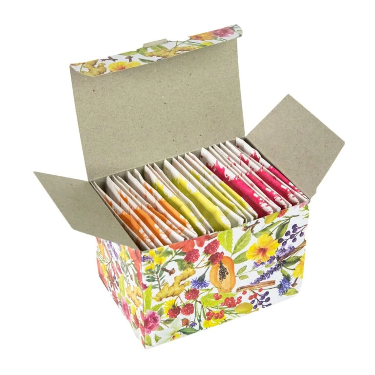 Assorted Carmién Rooibos tea sachets in a floral gift box, perfect for tea lovers seeking high-quality rooibos blends for brewing or gifting.
