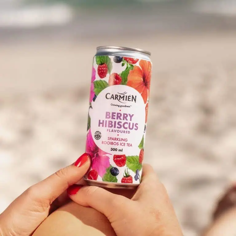 Delicious Berry Hibiscus flavoured sparkling Rooibos ice tea in a stylish can, showcasing vibrant berry and hibiscus illustrations, perfect for refreshing South African summer moments.