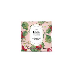 An SEO-friendly ALT tag for Carmién Tea's Strawberries & Cream Envelopes, highlighting natural ingredients and eco-friendly packaging.