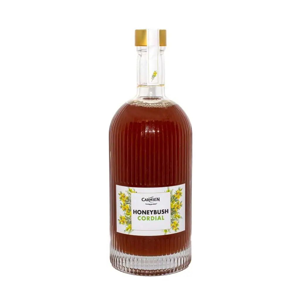 Rich honeybush herbal tea in a glass bottle with golden cap, promoting natural wellness and antioxidants.