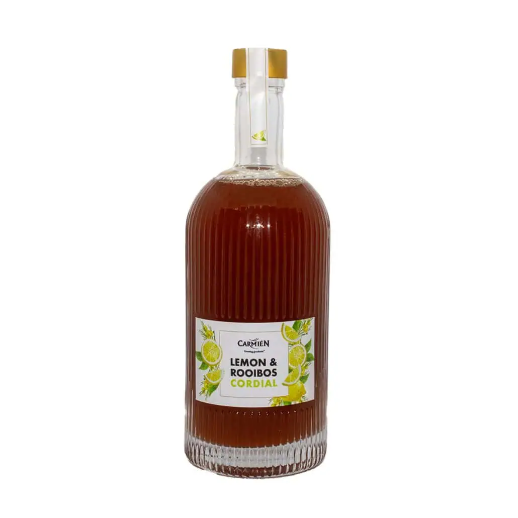 Refreshing Lemon & Rooibos Cordial in a clear ribbed glass bottle, highlighting the natural ingredients and vibrant citrus flavor, perfect for healthy, revitalizing beverages.