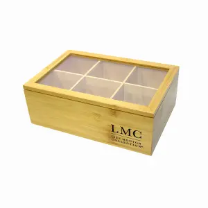 Natural wooden tea storage box with glass lid for preserving and displaying Carmién Tea products. Perfect for tea enthusiasts and collectors.