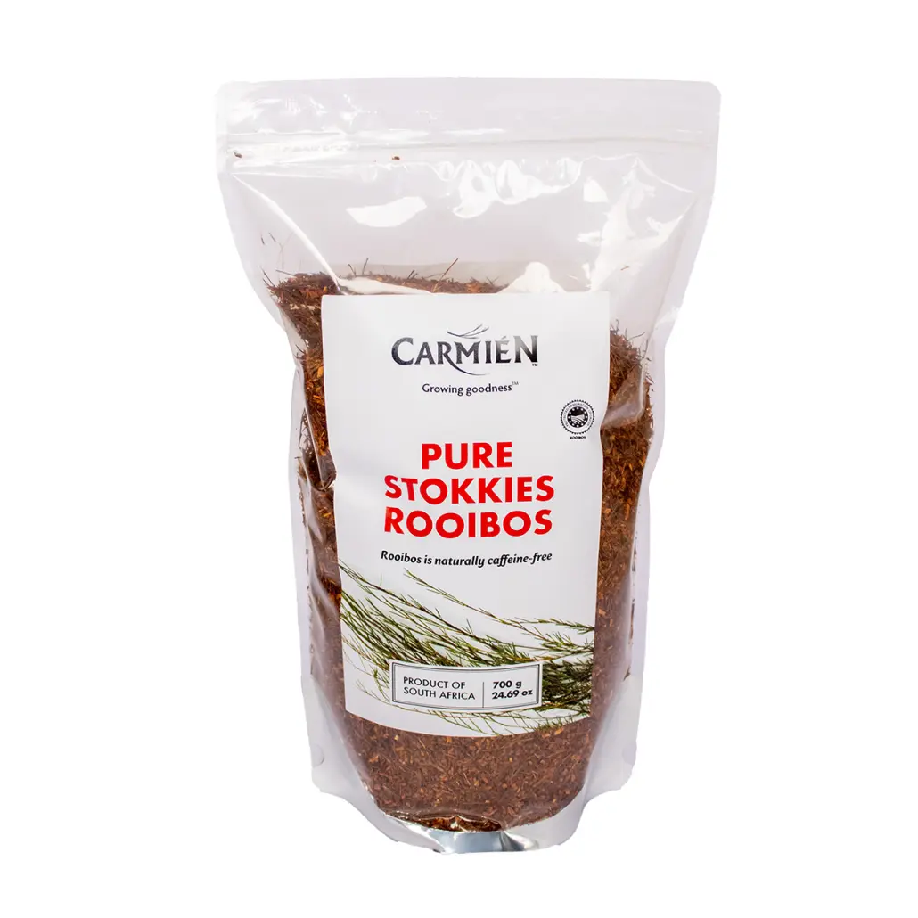 Rich rooibos tea leaves from South Africa in a resealable bag, ideal for crafting authentic Carmién Tea rooibos infusions.