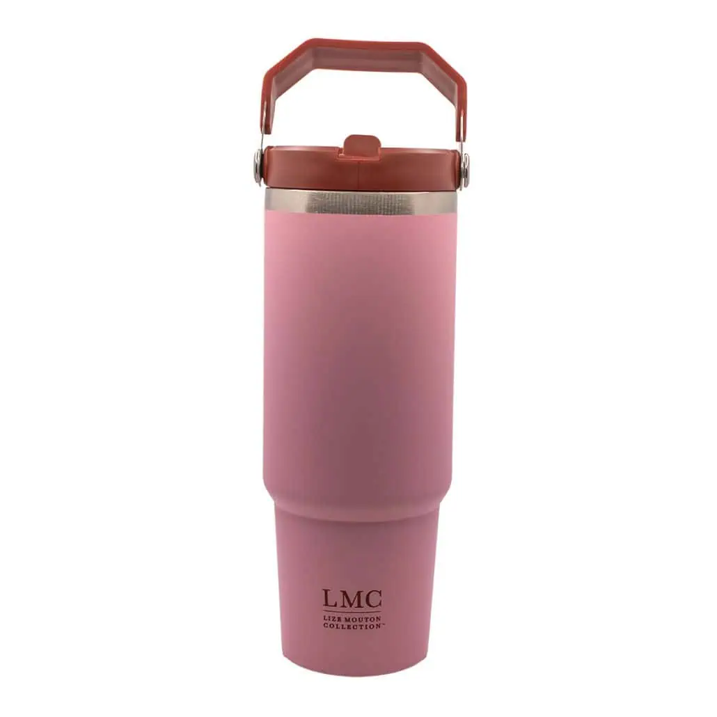 Stainless steel pink insulated travel mug with lid, ideal for tea lovers on the go, featuring Lize Mouton Collection branding. Perfect for enjoying Carmién Tea anytime, anywhere.