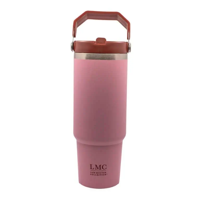 Stainless steel pink insulated travel mug with lid, ideal for tea lovers on the go, featuring Lize Mouton Collection branding. Perfect for enjoying Carmién Tea anytime, anywhere.