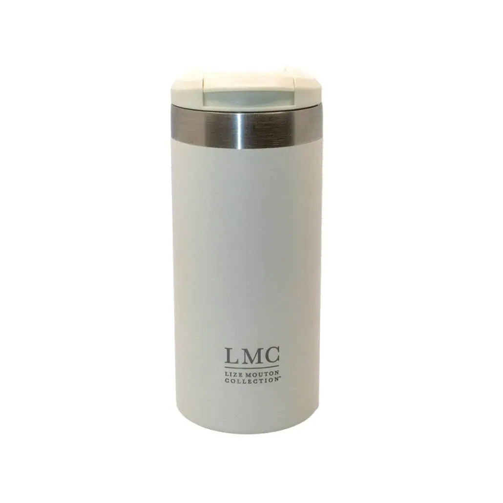 Steaming mug with Liz Mouton Collection branding, perfect for enjoying Carmién Tea, a popular South African herbal tea known for its health benefits and unique floral flavor.