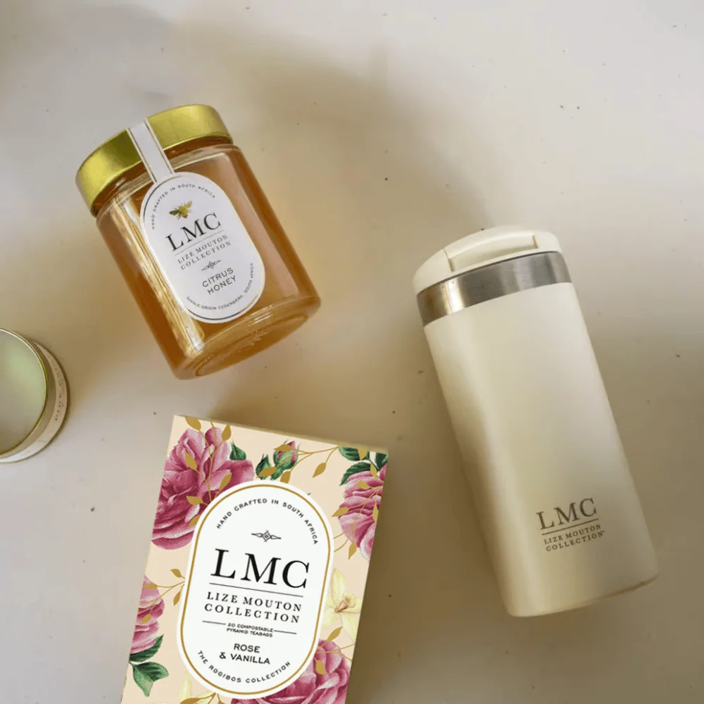 Delicious LMC Rose and Vanilla tea with honey jar for gifting. Perfect for tea lovers, combining floral and sweet flavors in an elegant presentation.